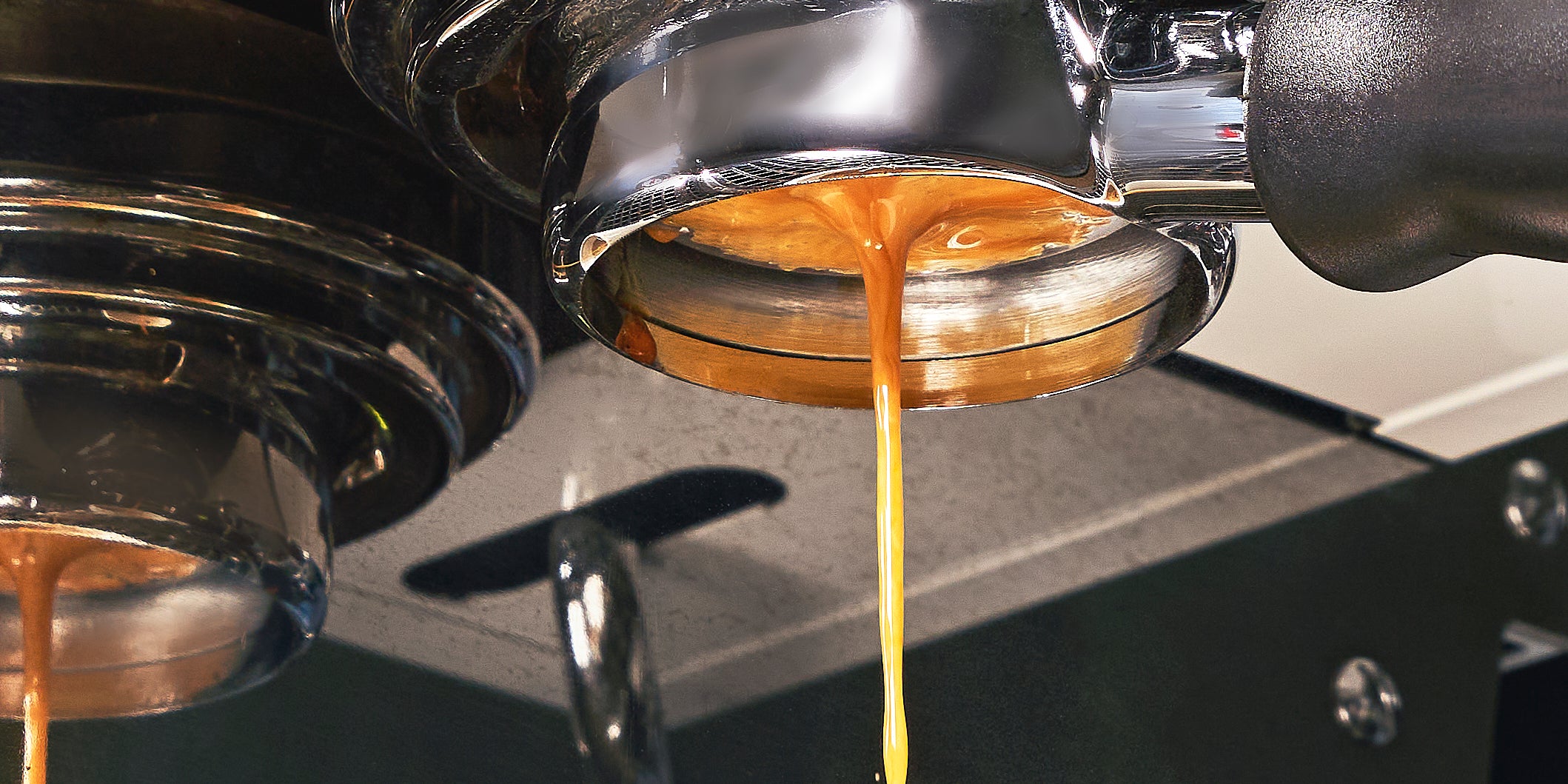 photograph of espresso coming out of portafilter